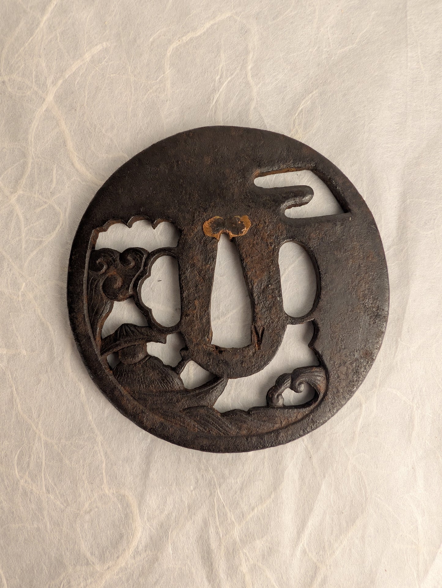 Iron Sukashi Tsuba Depicting Boatman Battered By Waves – TS-046