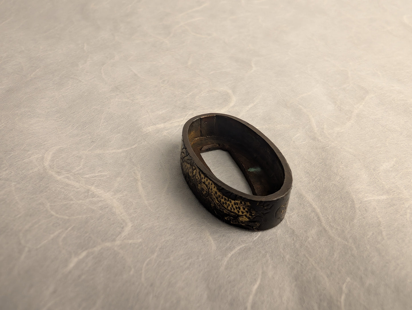 Shakudo Fuchi with Dragon and Clouds in Gilt Relief - FU-016