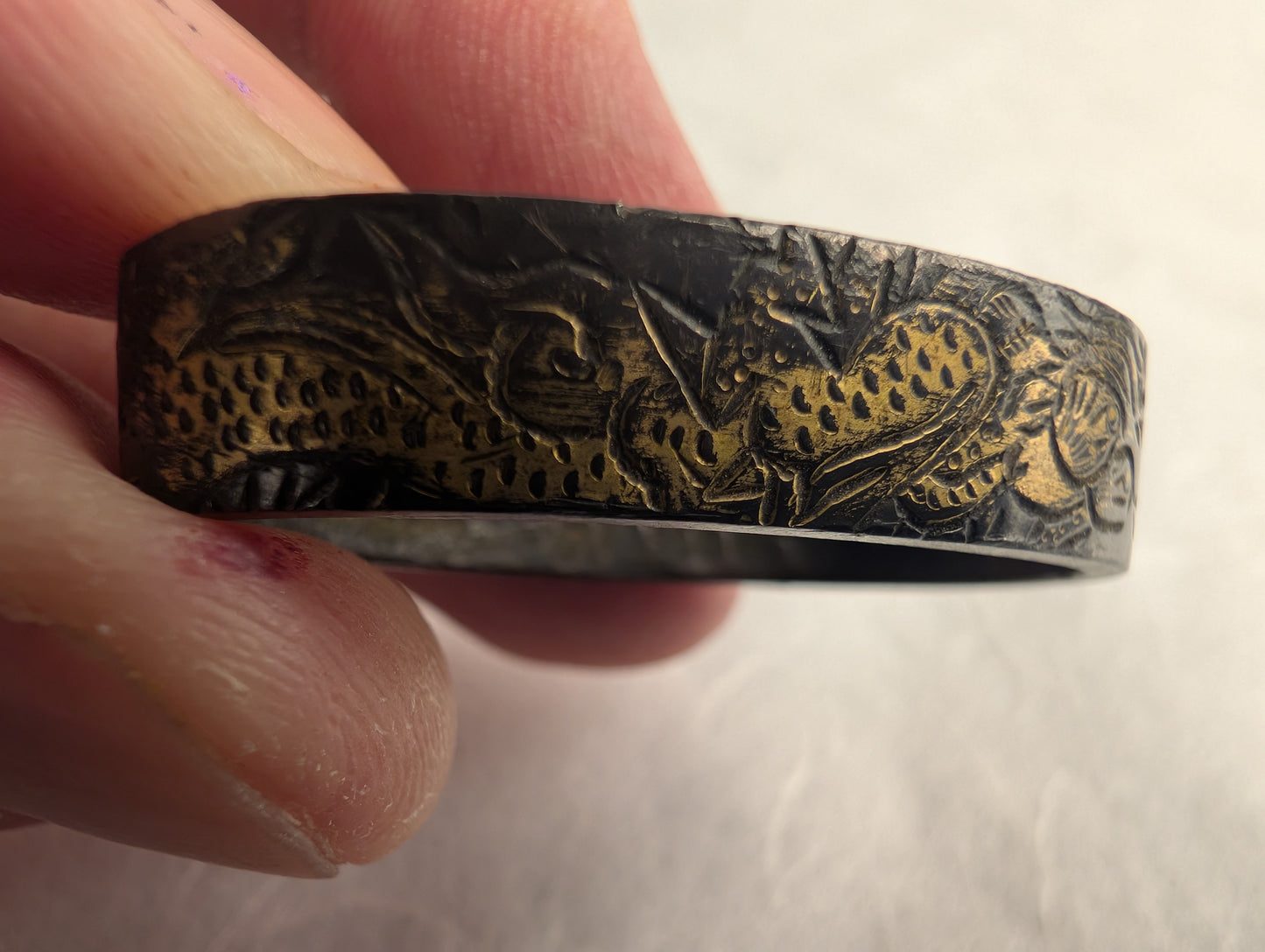 Shakudo Fuchi with Dragon and Clouds in Gilt Relief - FU-016