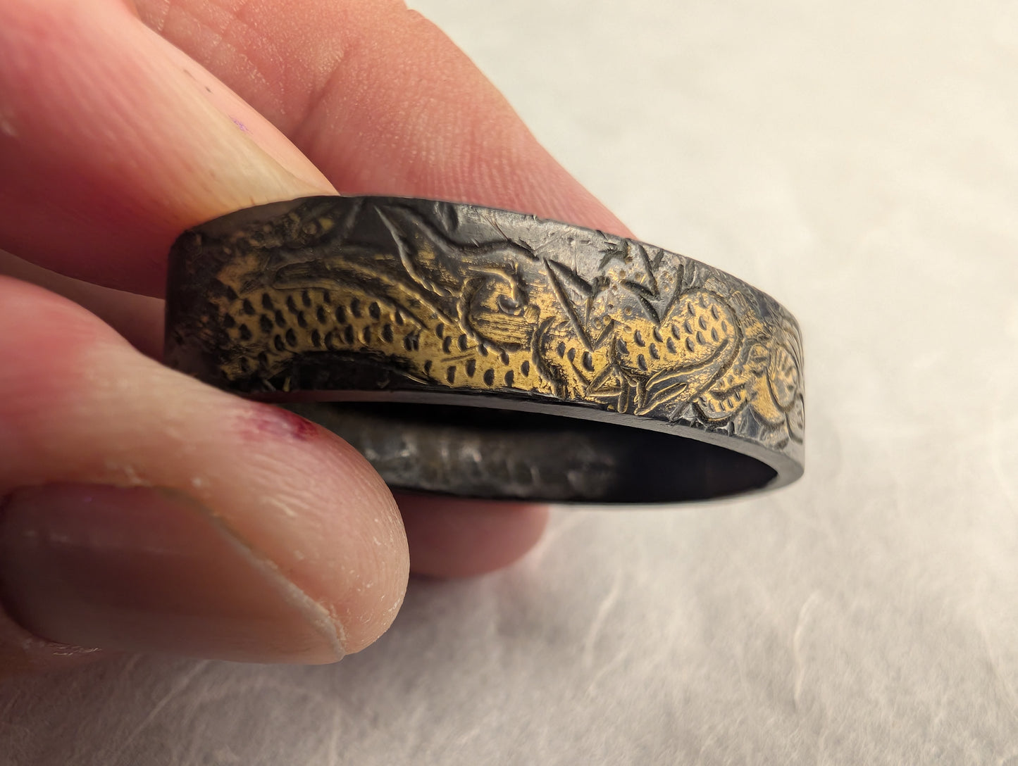 Shakudo Fuchi with Dragon and Clouds in Gilt Relief - FU-016