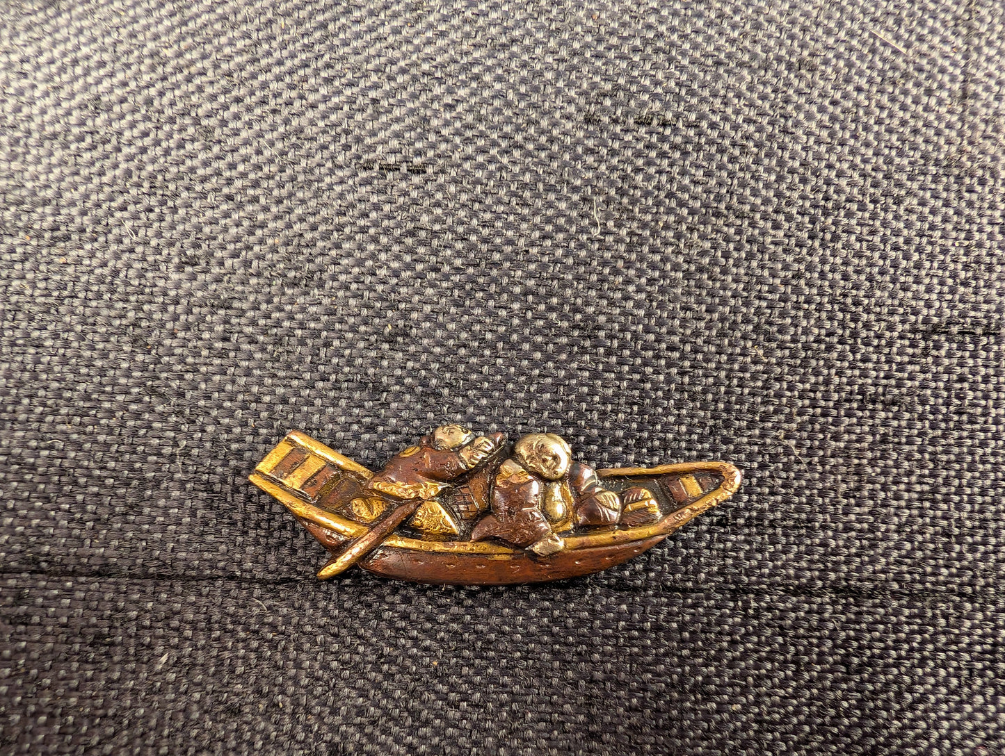 Single Menuki of Two Figures Laughing On A Boat – MS-035