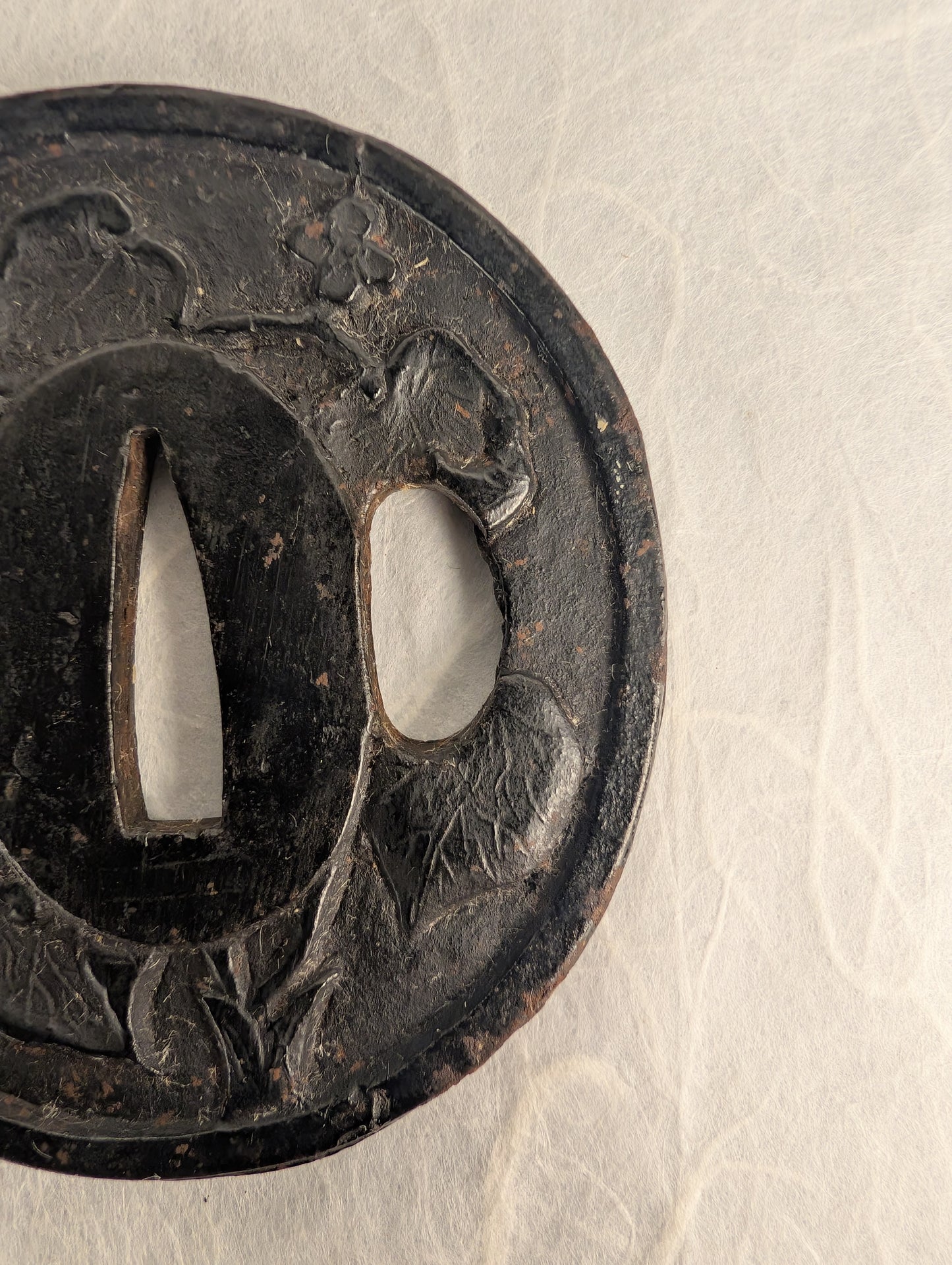 Iron Tsuba with Floral Relief – TS-042