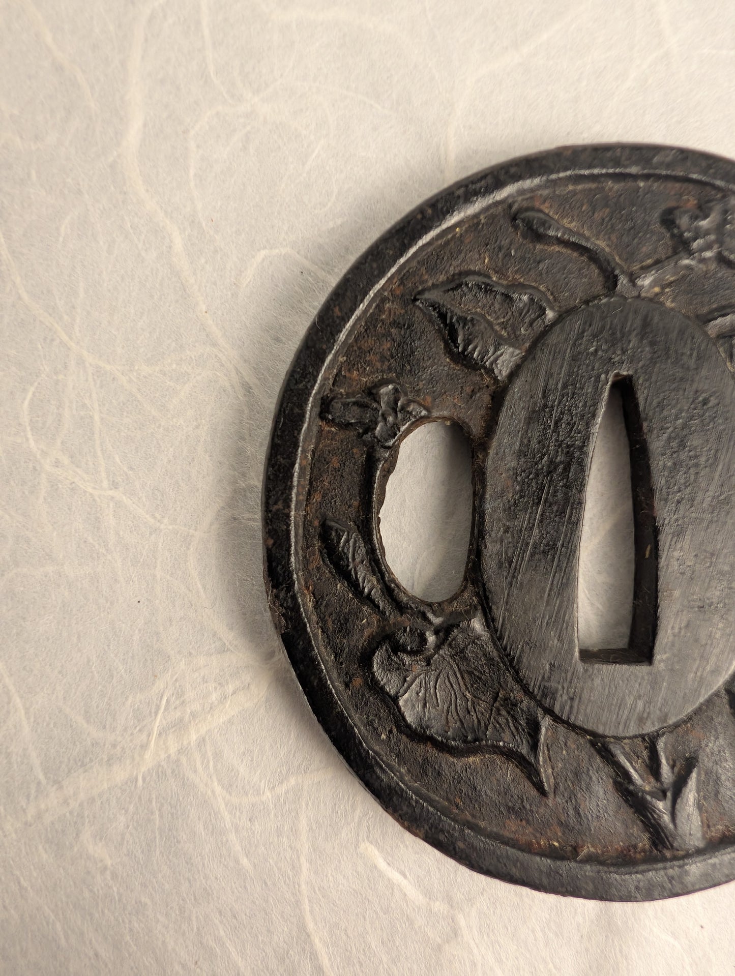 Iron Tsuba with Floral Relief – TS-042