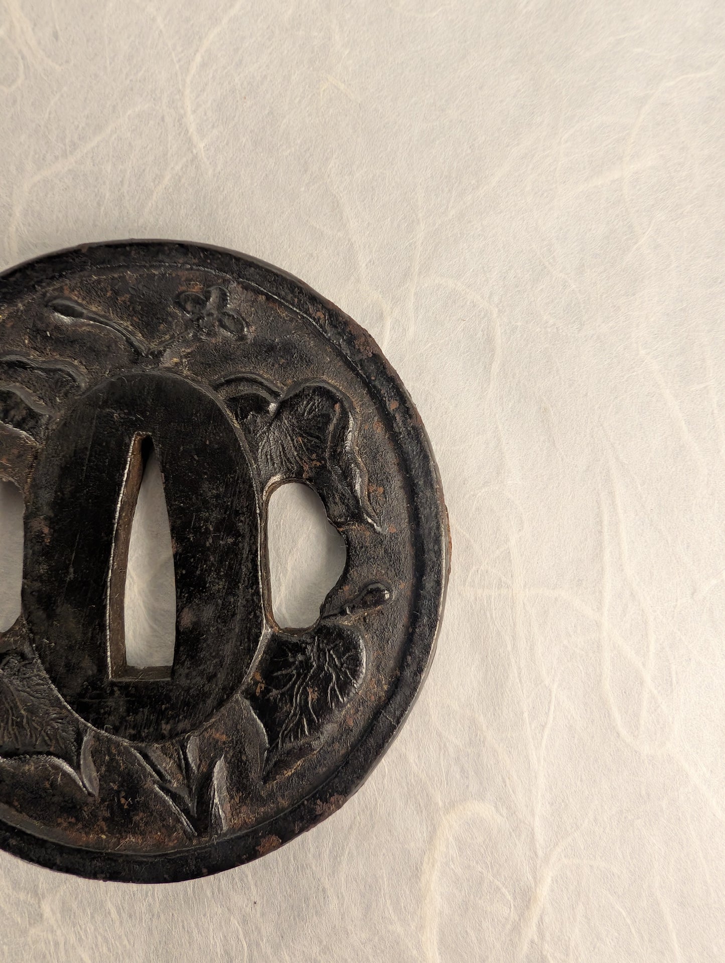 Iron Tsuba with Floral Relief – TS-042
