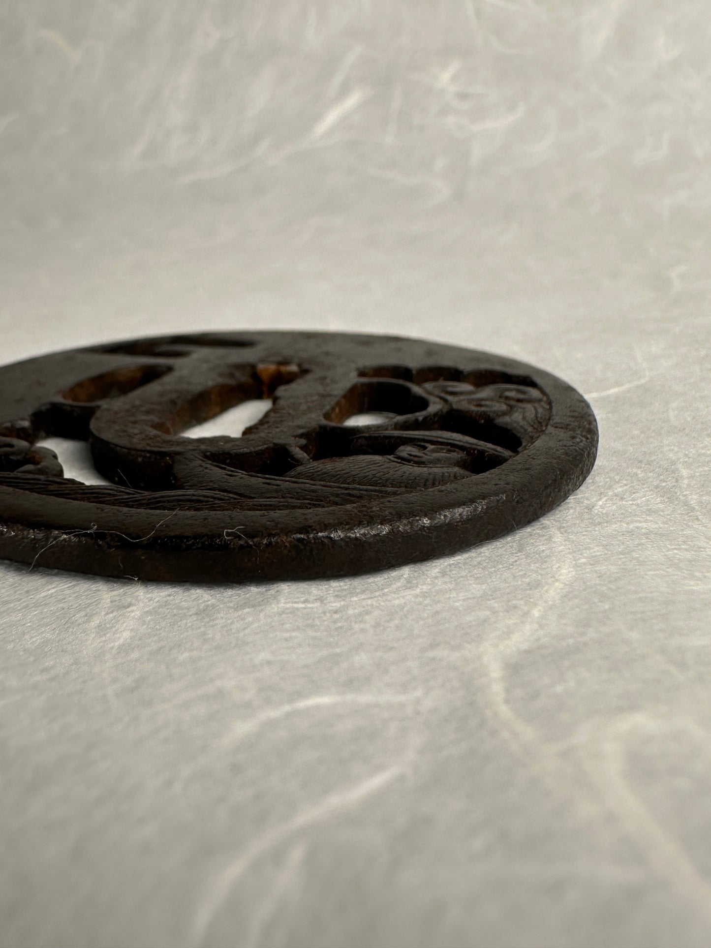 Iron Sukashi Tsuba Depicting Boatman Battered By Waves – TS-046