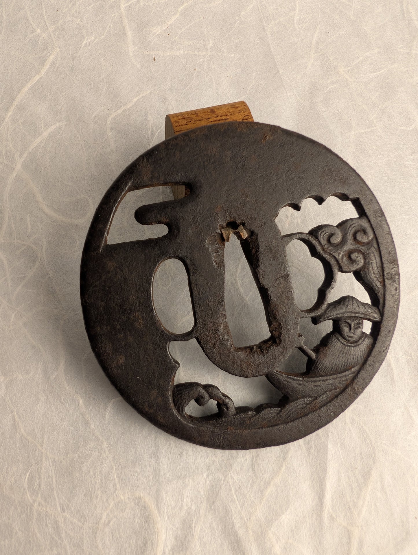 Iron Sukashi Tsuba Depicting Boatman Battered By Waves – TS-046