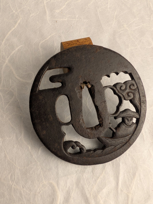 Iron Sukashi Tsuba Depicting Boatman Battered By Waves – TS-046