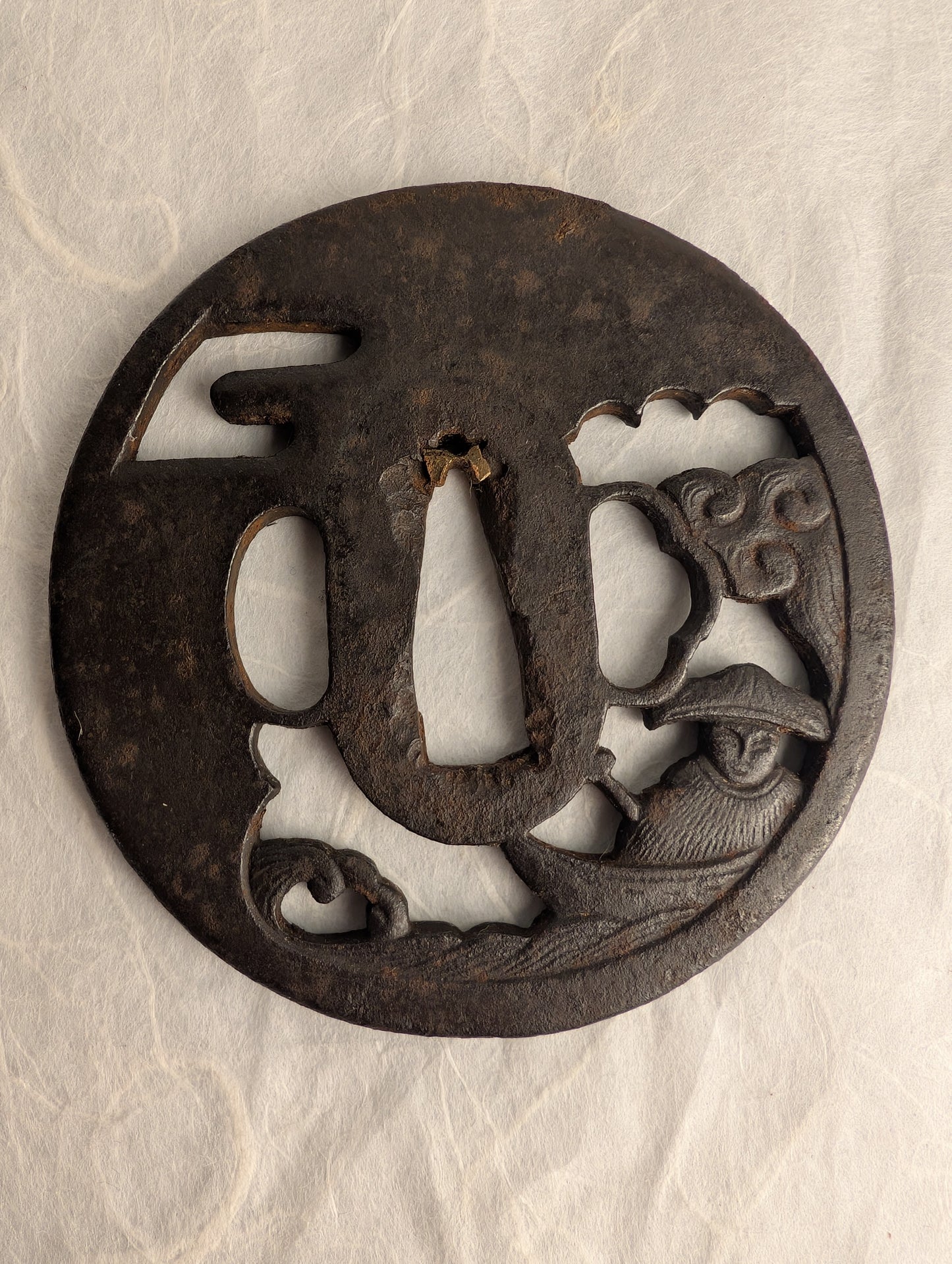 Iron Sukashi Tsuba Depicting Boatman Battered By Waves – TS-046