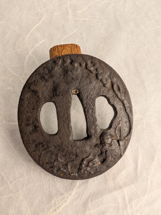 Iron Tsuba with Seated Archer Motif – TS-060