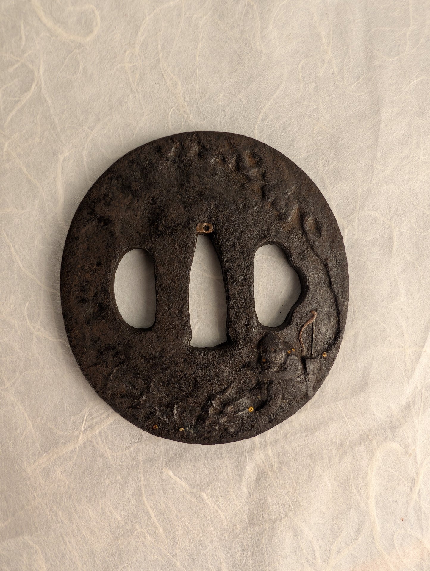 Iron Tsuba with Seated Archer Motif – TS-060