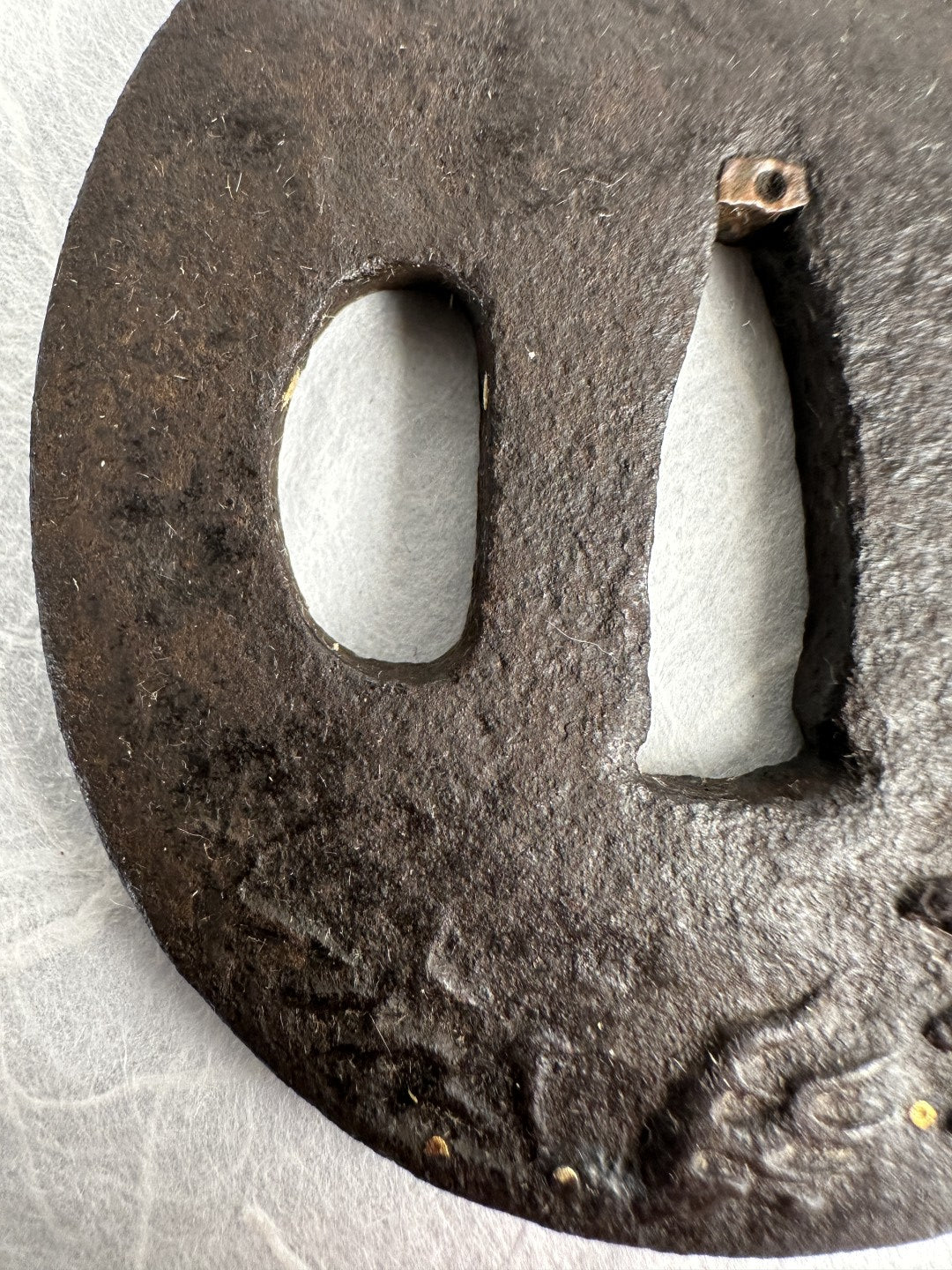 Iron Tsuba with Seated Archer Motif – TS-060