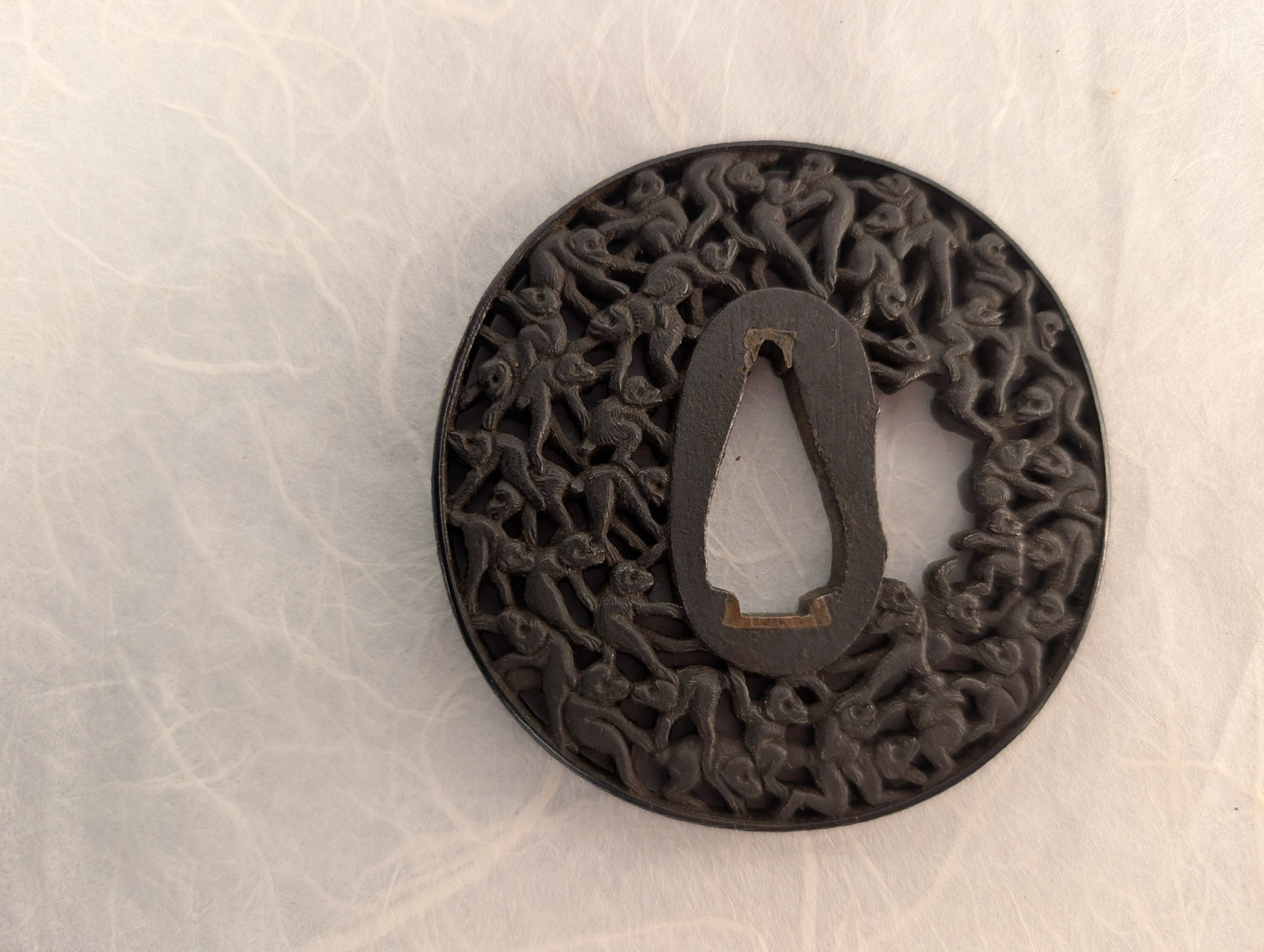 Iron Sukashi Tsuba Depicting Swarm of Monkeys – TS-101