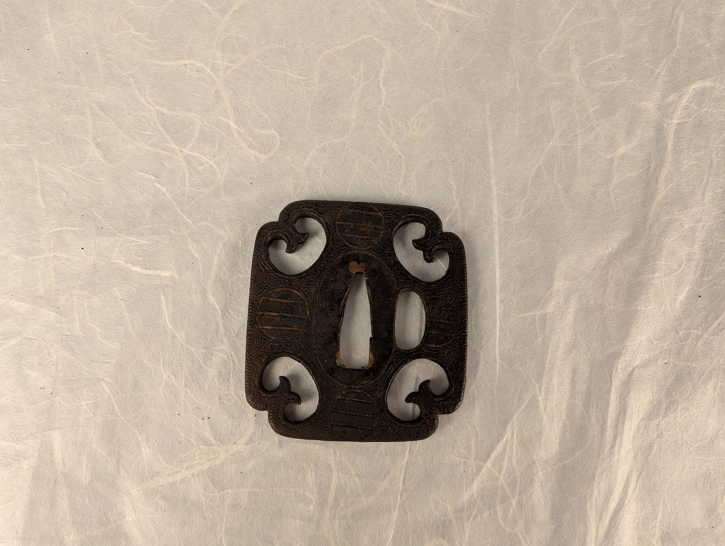 Iron Mokko-Gata Sukashi Tsuba with Scrolling Forms and Katakiri Engraving – TS-118