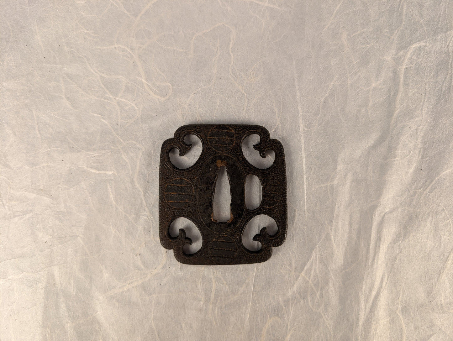 Iron Mokko-Gata Sukashi Tsuba with Scrolling Forms and Katakiri Engraving – TS-118