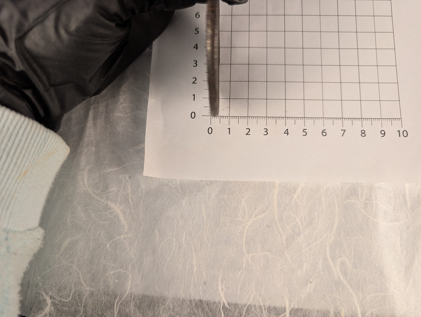 Iron Tsuba with Man Resting By Water - TS-122