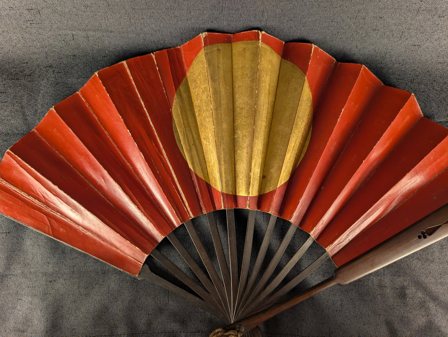 Antique Japanese Wooden War Fan with Red and Gold Sun Motif – TN-001