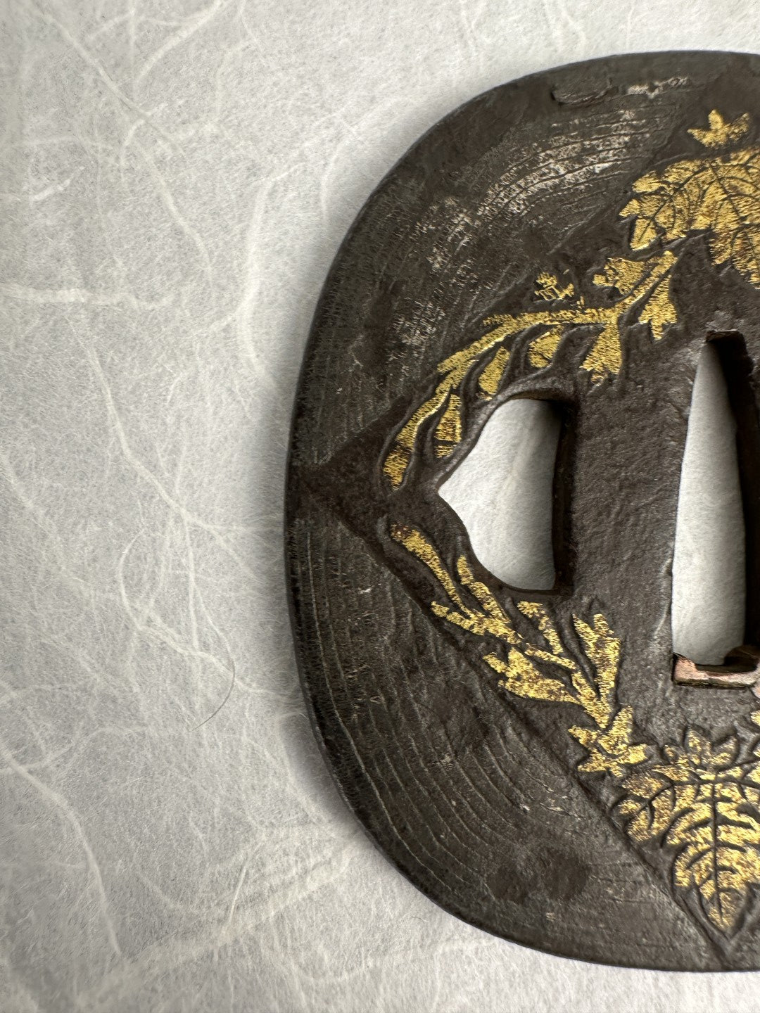 Iron kaku-maru Tsuba with Gilt Floral Motif – TS-072