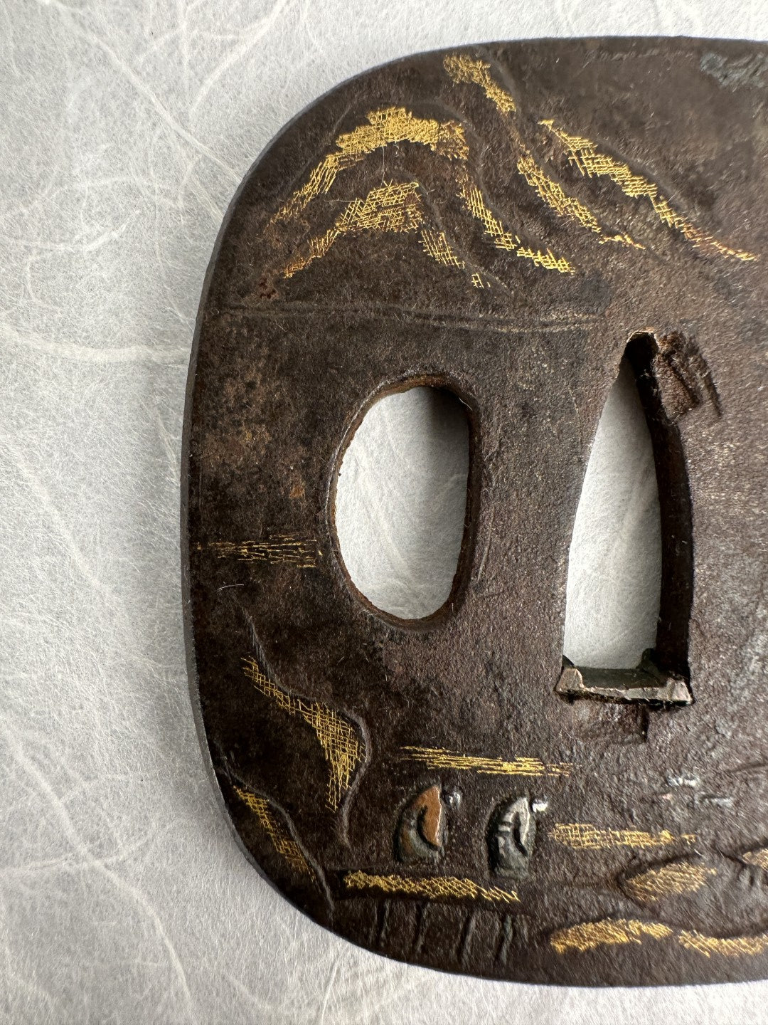 Iron Kaku-maru Tsuba with Inlaid Praying Figures in Nunome-gold Mountains– TS-073